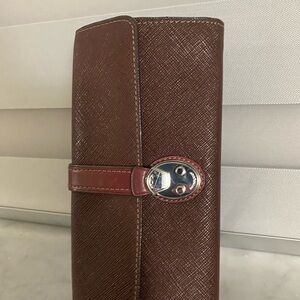 Tumi burgundy Textured Wallet with Buckle